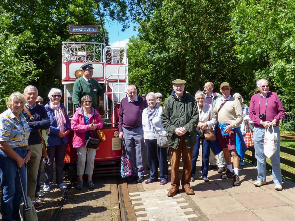 Club members and tram